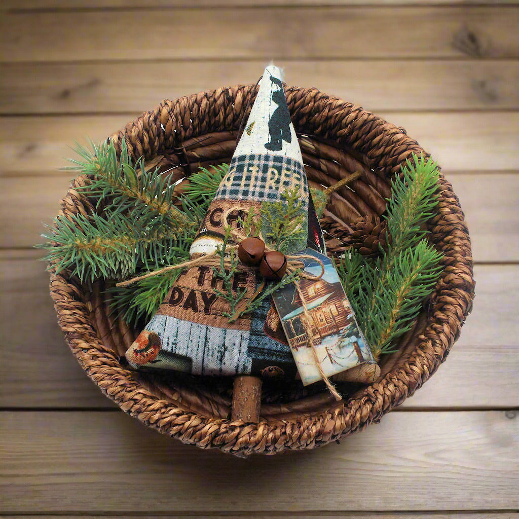 Tree-shaped Christmas ornament or bowl filler sewn from a cotton print fabric with a fishing cabin design