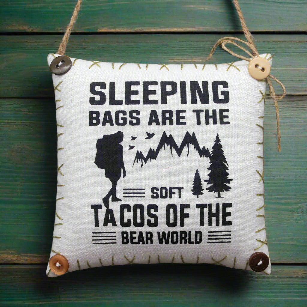Decorative mini pillow sign with humorous camping quote