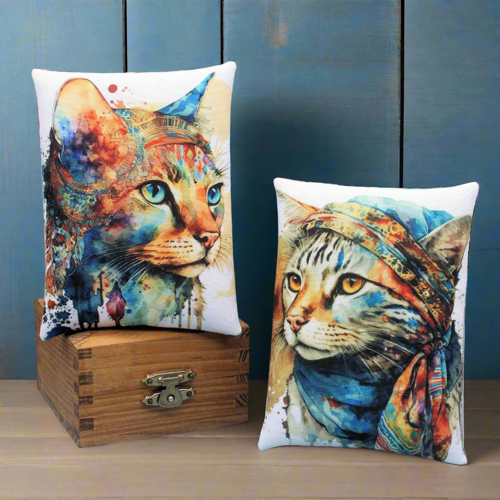 Two miniature pillows with images of boho watercolor cats