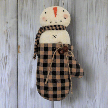 Primitive snowman ornament in a homespun mitten