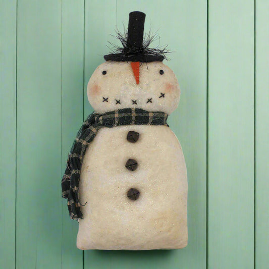 Handmade snowman ornament with a black top hat, carrot nose, and plaid scarf