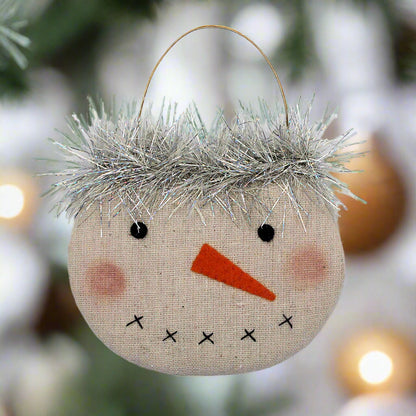 Decorative snowman face ornament with tinsel hair