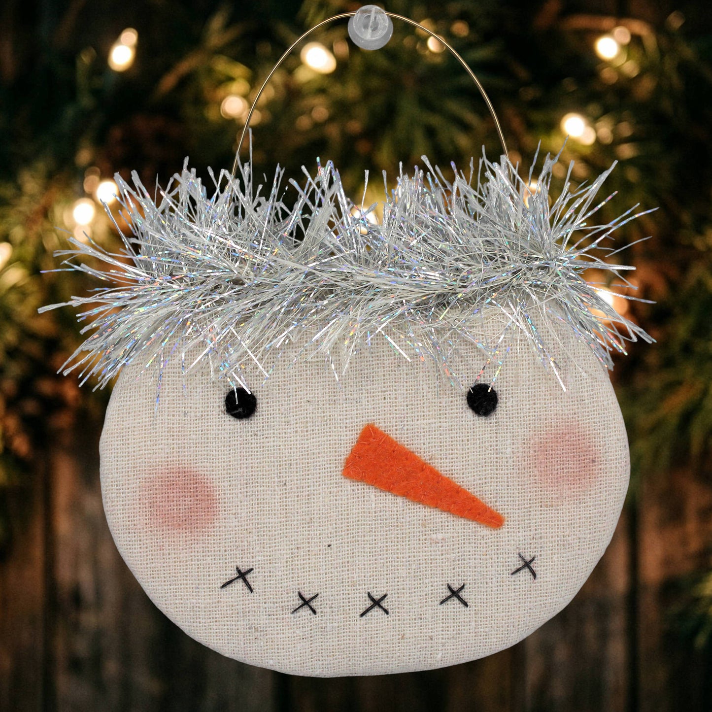 Handmade primitive snowman face ornament with tinsel hair