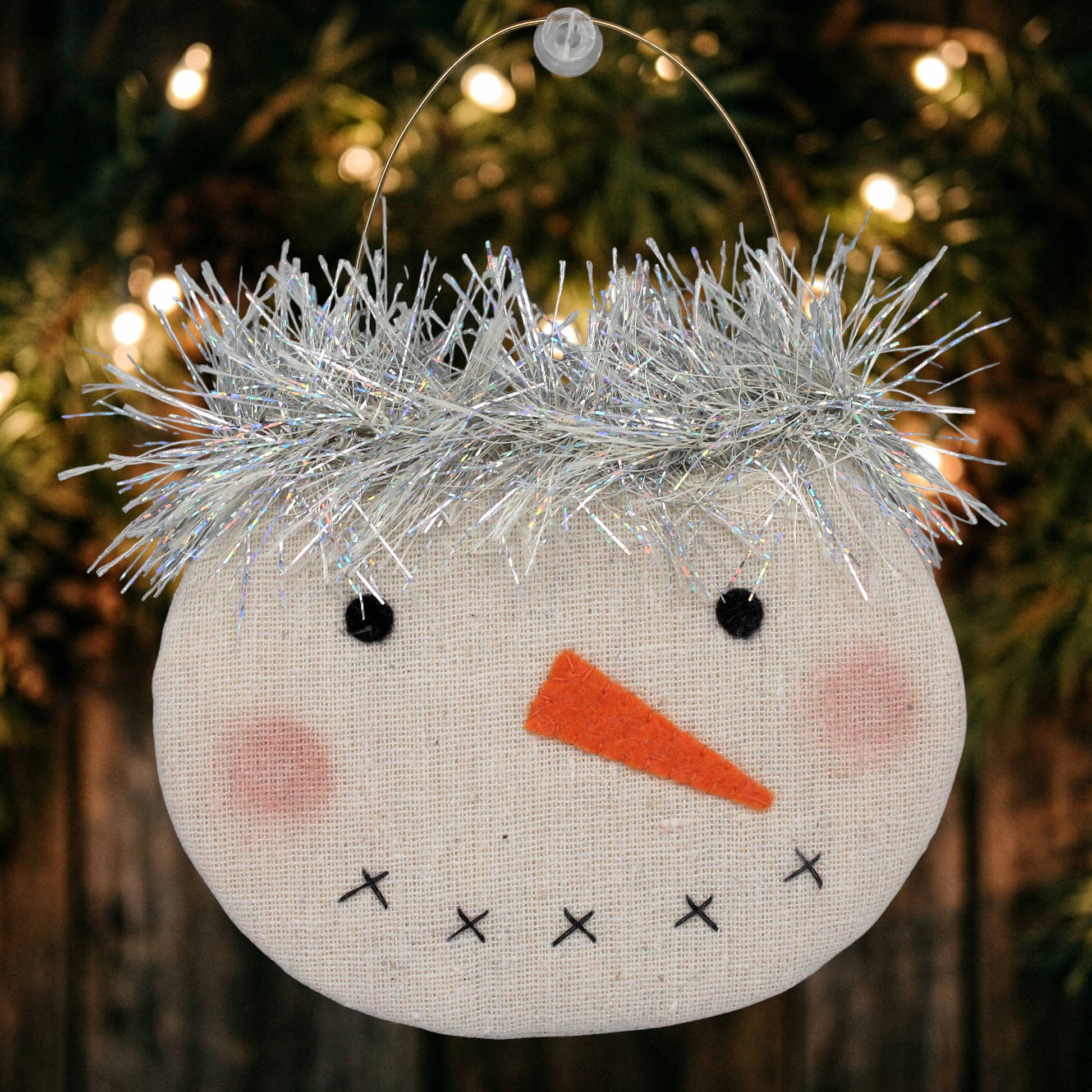 Handmade primitive snowman face ornament with tinsel hair