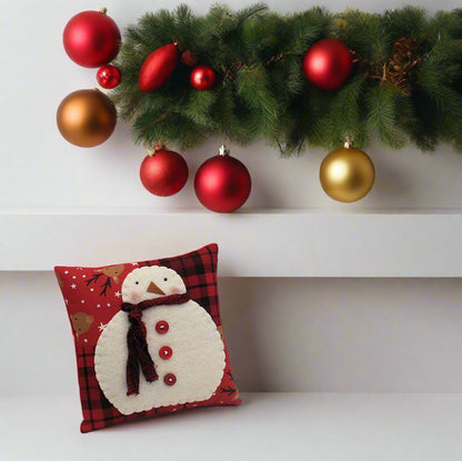 Decorative pillow with a snowman design