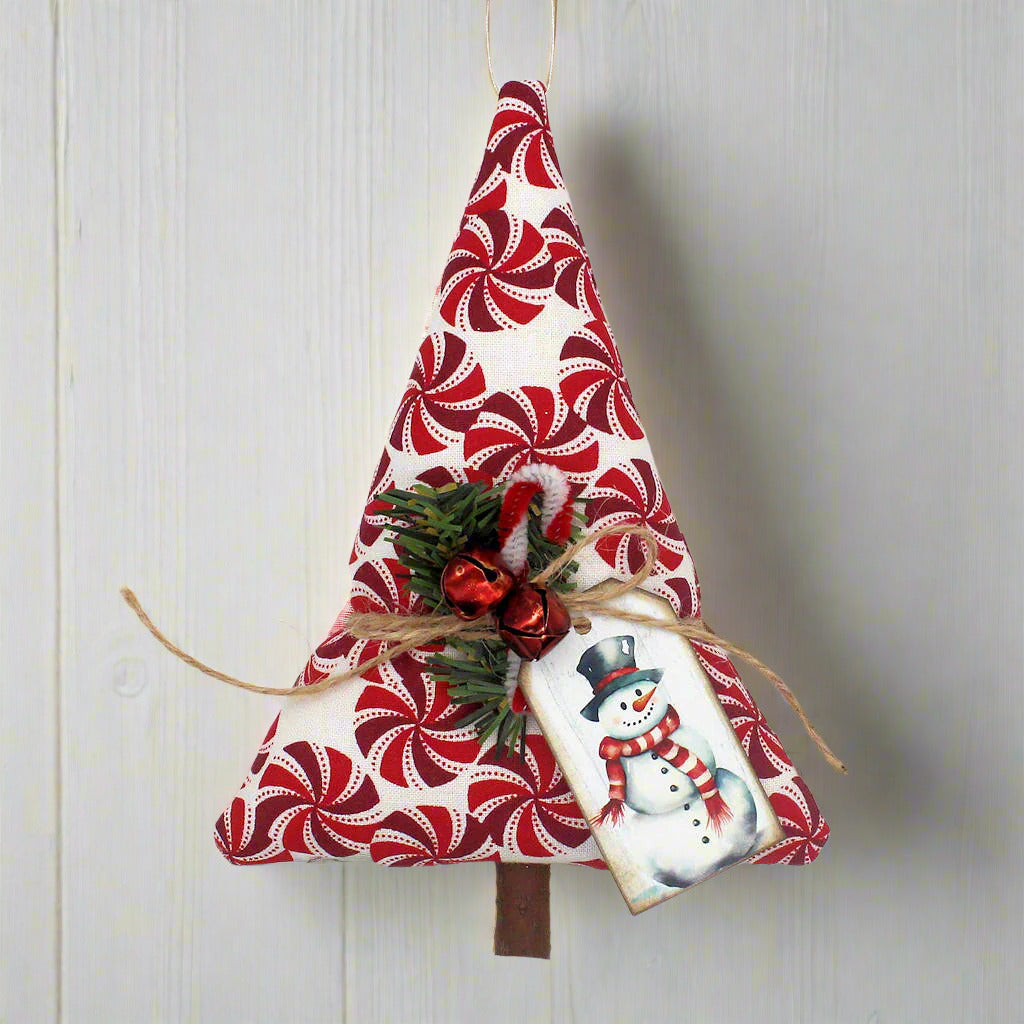 Decorative Christmas tree ornament with candy cane pattern on a white background
