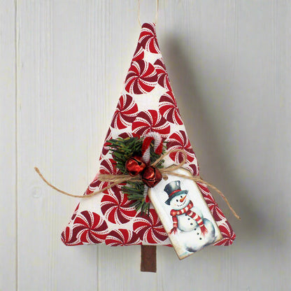 Decorative Christmas tree ornament with candy cane pattern on a white background