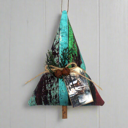 Tree-shaped Christmas ornament with bells and a tag