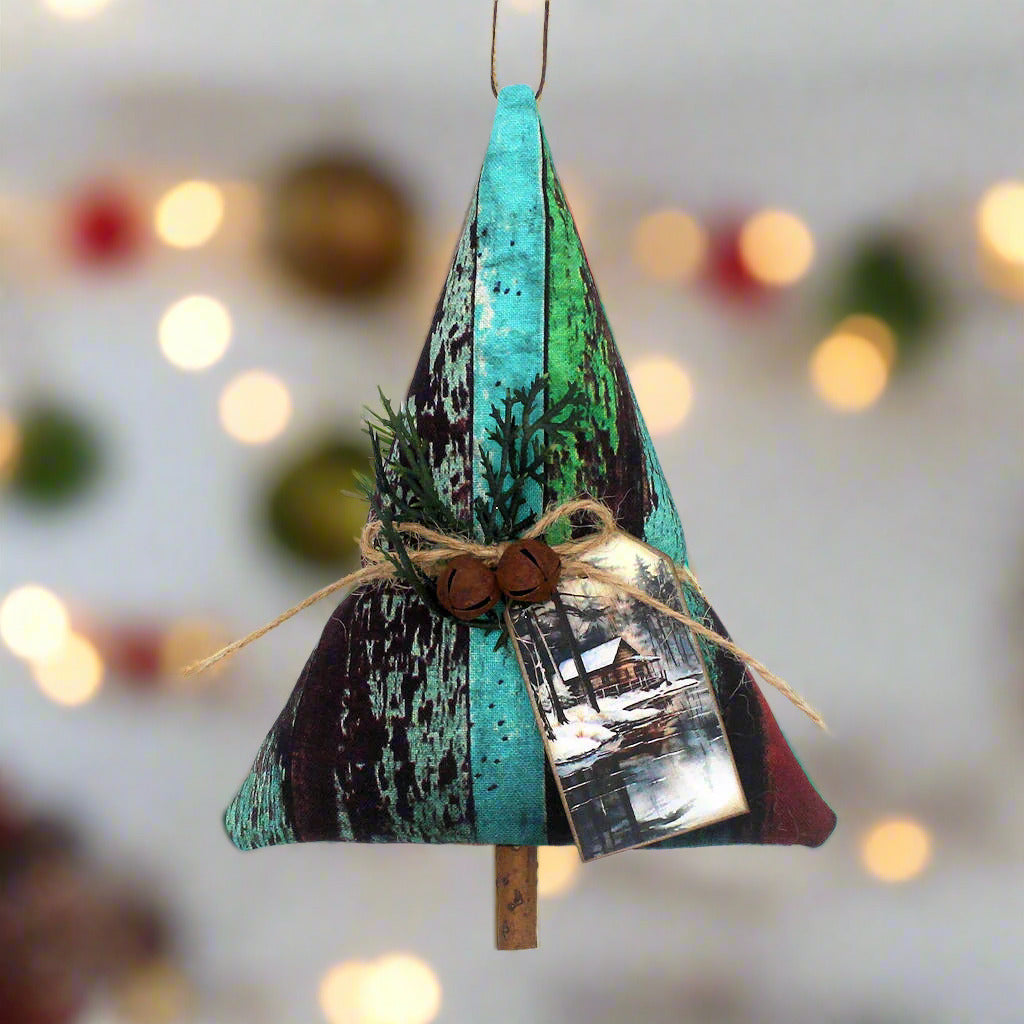 Tree-shaped Christmas ornament with bells and a tag