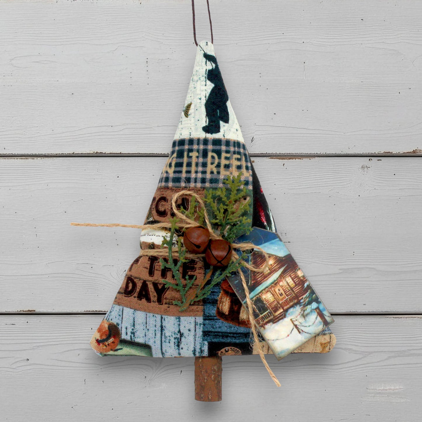 Decorative tree-shaped Christmas ornament made from fishing-themed fabric