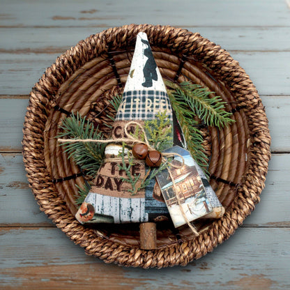Decorative Christmas tree-shaped ornament with a fishing cabin design to the fabric