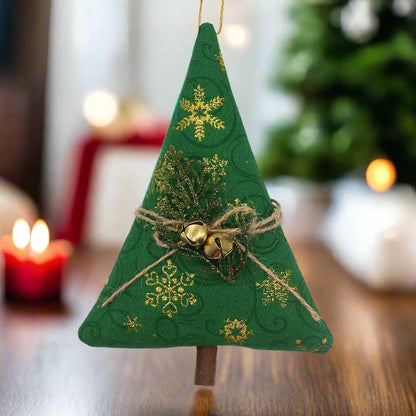 Green fabric Christmas tree ornament with gold snowflakes and jingle bells