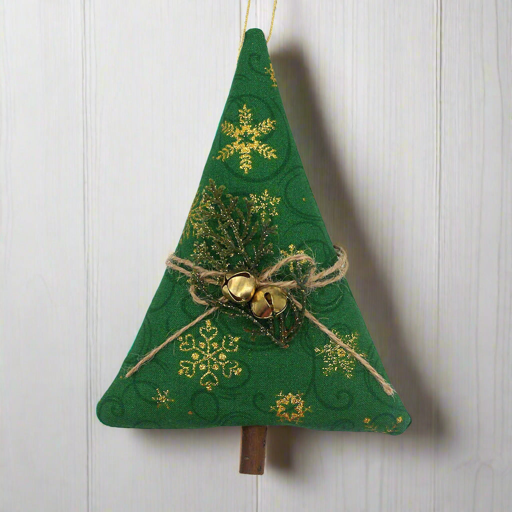Tree-shaped Christmas ornament or bowl filler with metallic gold snowflakes on a green background