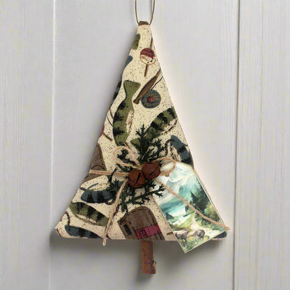 Decorative Christmas tree ornament with nature-themed design on a white background