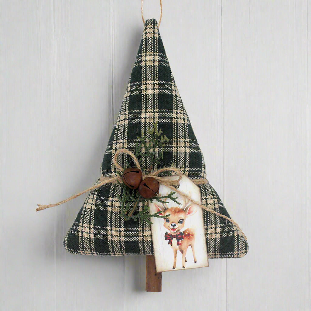 Tree-shaped Christmas ornament or bowl filler from green homespun fabric with rusty bells, greenery and a tag