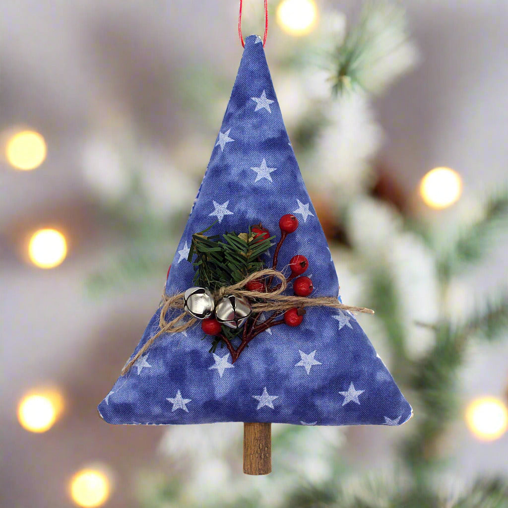 Tree-shaped Christmas ornament or bowl filler with stars on a blue background