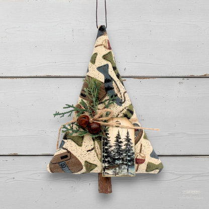 Decorative Christmas tree ornament with nature-themed design on a white background