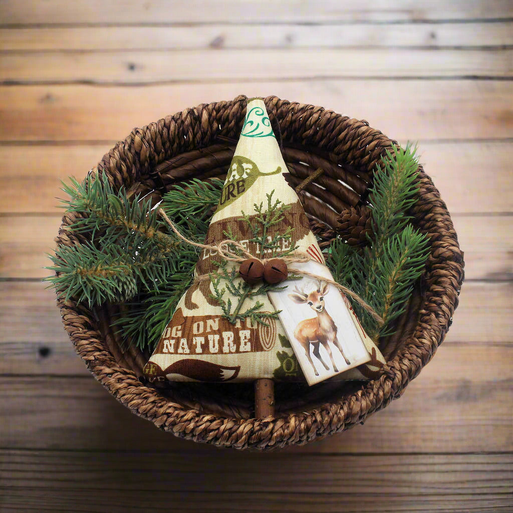 Tree-shaped Christmas ornament or bowl filler with rusty bells and a tag