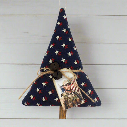 Tree-shaped Christmas ornament or bowl filler with red and white stars on a dark blue background