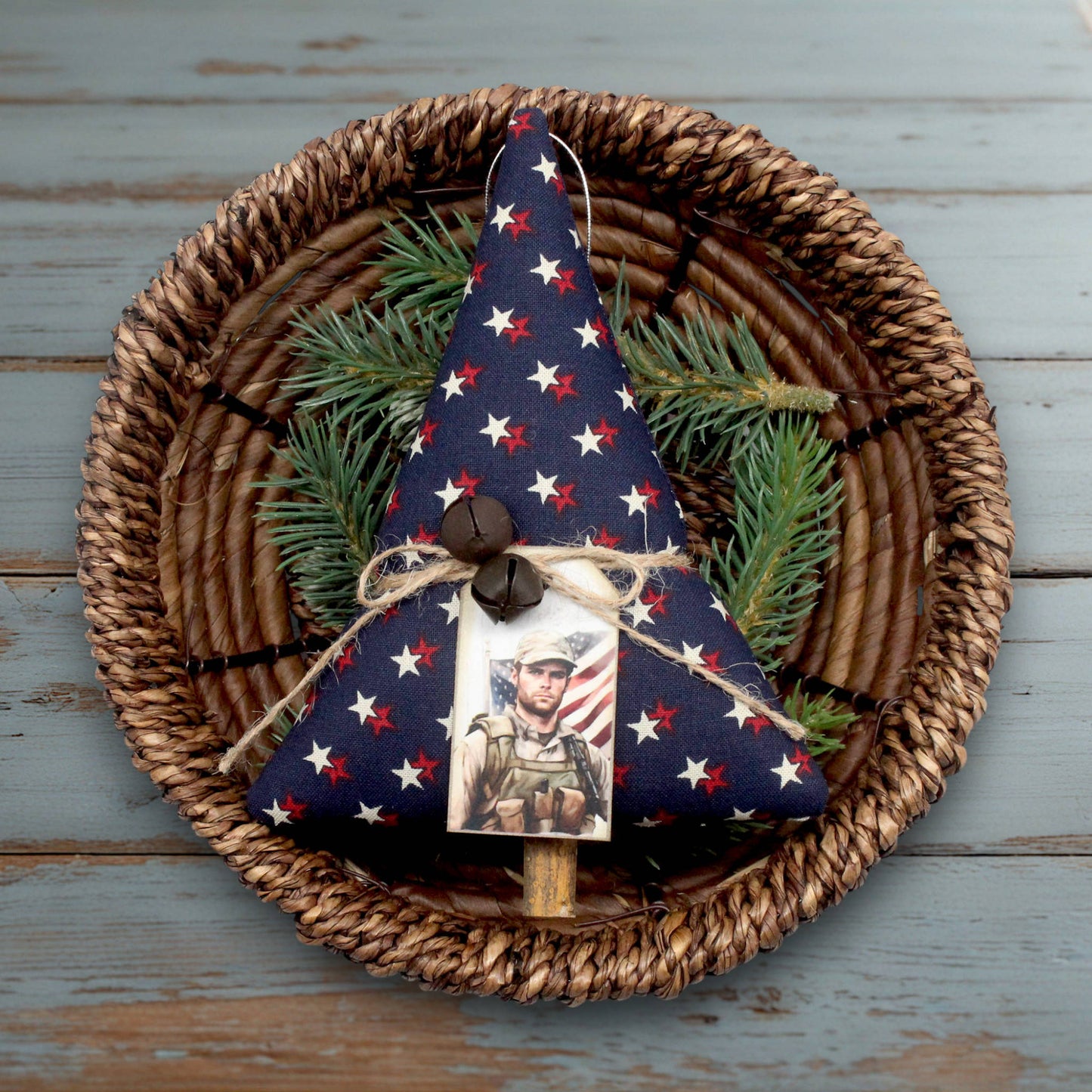 Decorative Christmas tree ornament with a photo of a soldier on a woven plate.