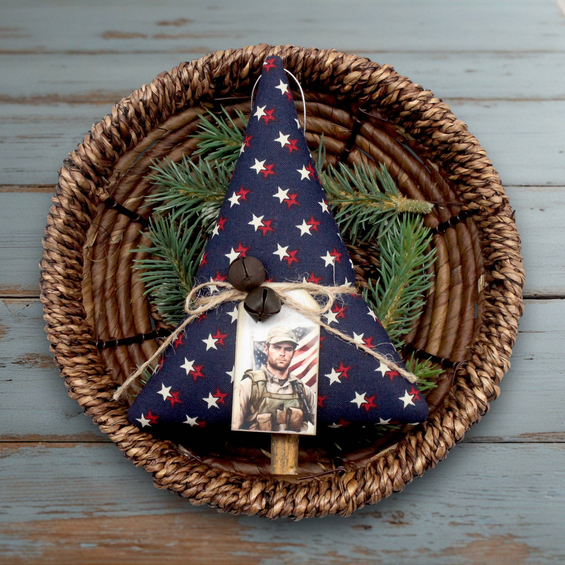 Decorative Christmas tree ornament with a photo of a soldier on a woven plate.