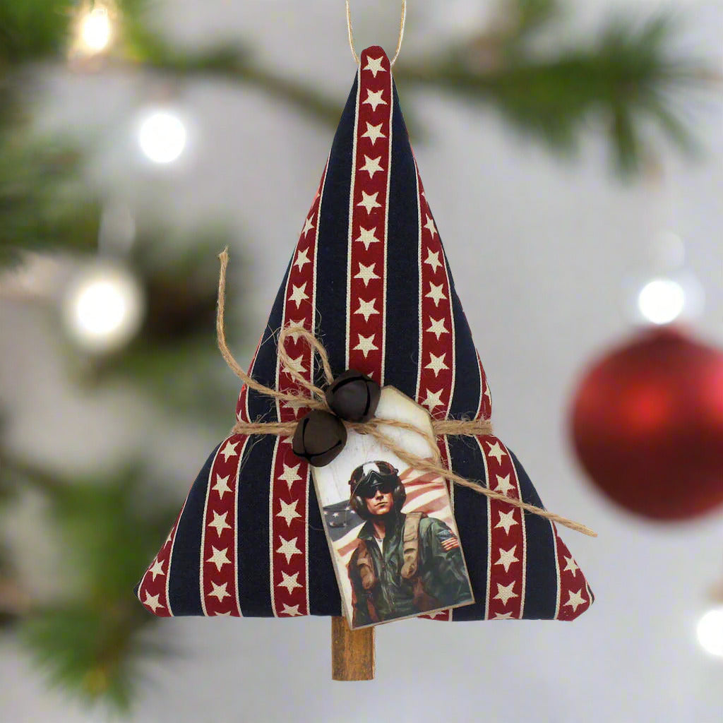 Tree-shaped Christmas ornament or bowl filler with Americana print fabric and a member of the military on the tag