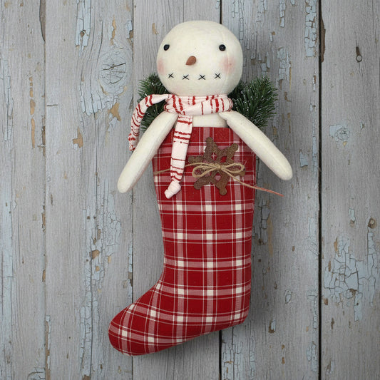 Primitive snowman in a red and white homespun stocking
