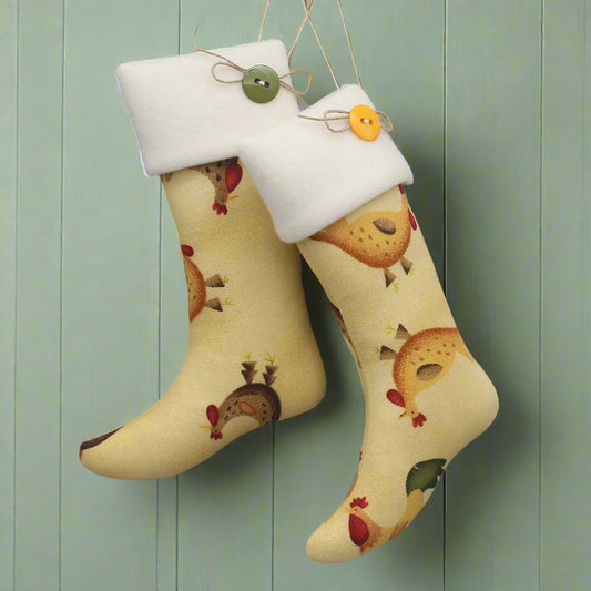 Pair of Christmas stocking ornaments with a chicken pattern and white cuffs decorated with buttons