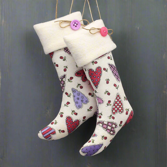 Decorative stocking ornaments with colorful heart patterns