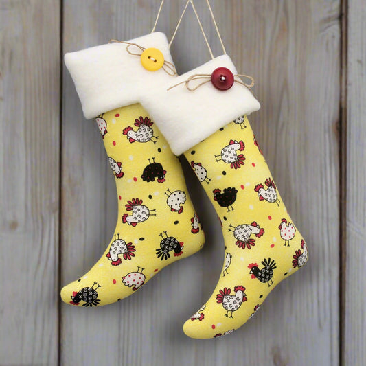 Yellow stocking ornaments with chicken pattern and white cuffs