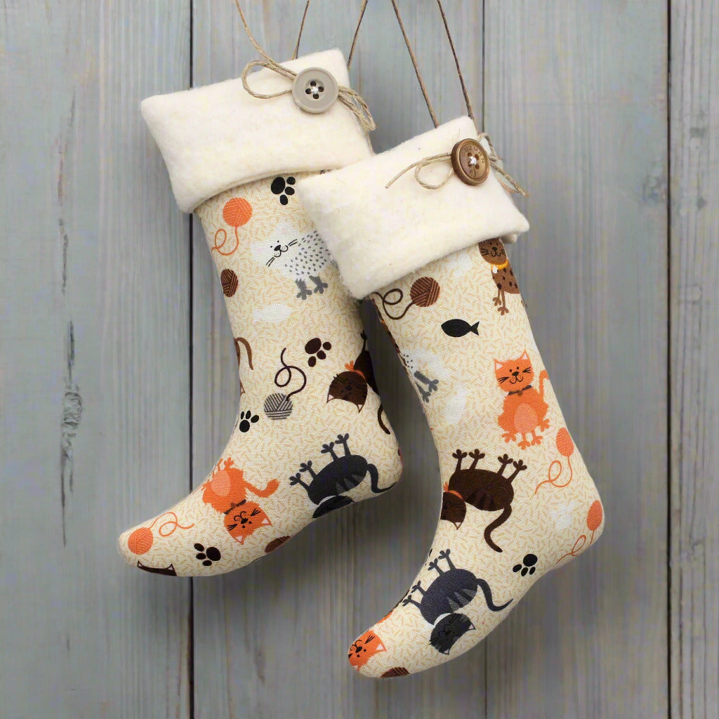 Two decorative stockings with animal patterns