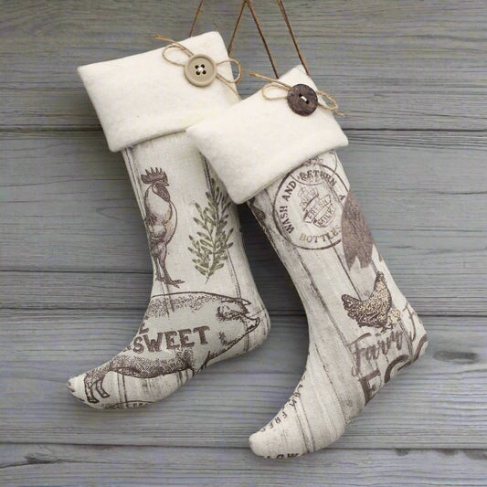 Decorative stockings with vintage-style patterns on a gray background