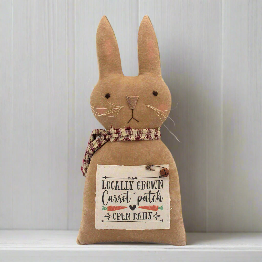 Primitive bunny rabbit doll with a carrot patch sign