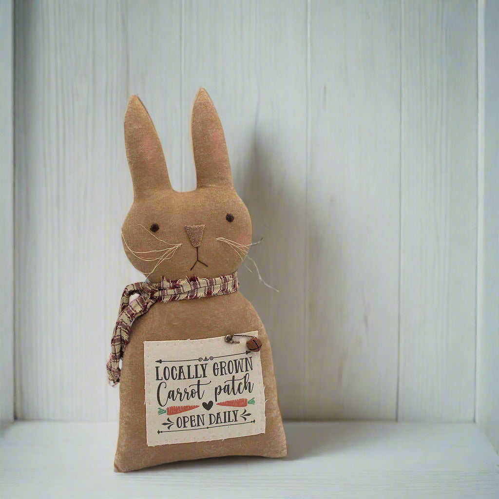 Primitive bunny rabbit doll with a carrot patch sign