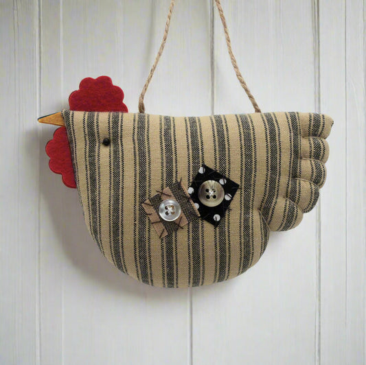 Decorative chicken ornament with striped pattern and buttons on a white background