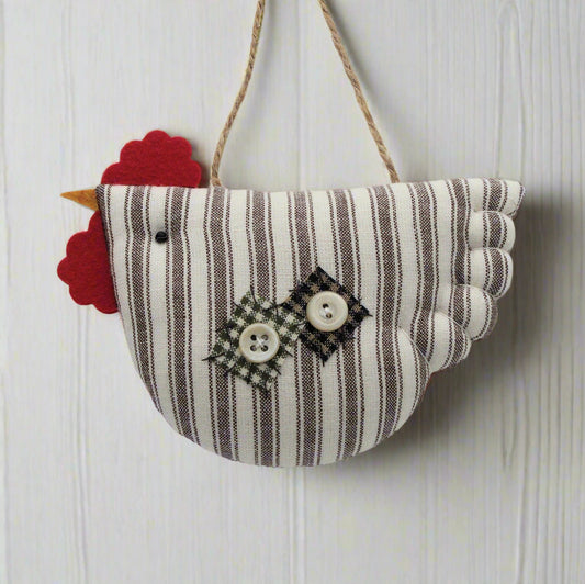 Decorative chicken ornament with striped pattern, buttons, and floral design on a white background.