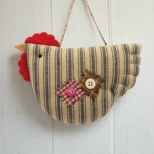 Striped fabric chicken-shaped decoration with buttons on a white background