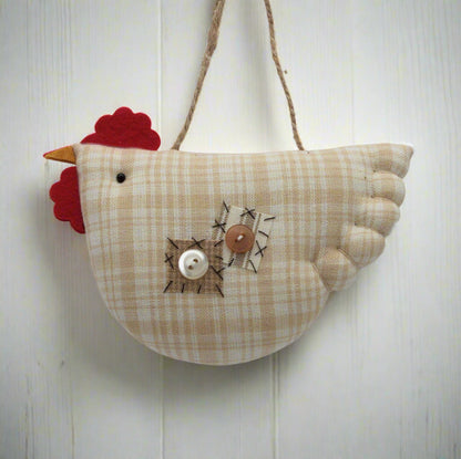 Fabric chicken-shaped hanging decoration on a white background