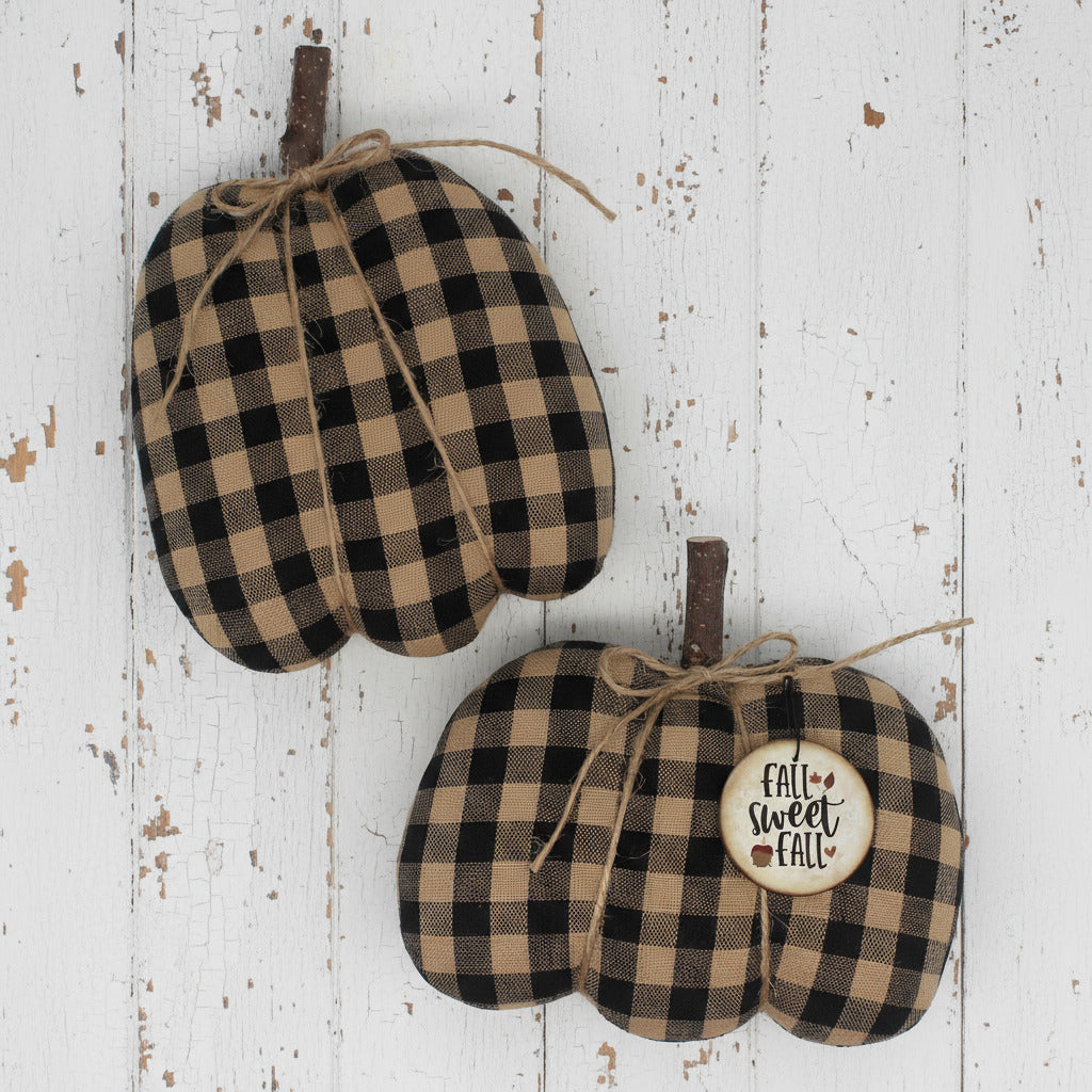Two homespun pumpkins with a 'Fall Sweet Fall' tag on a wooden surface