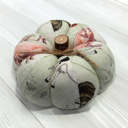 Fabric pumpkin with a farm animals pattern