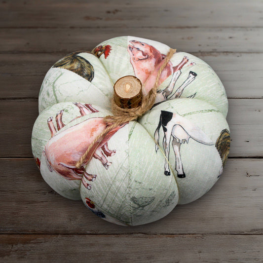 Fabric pumpkin with a farm animals pattern