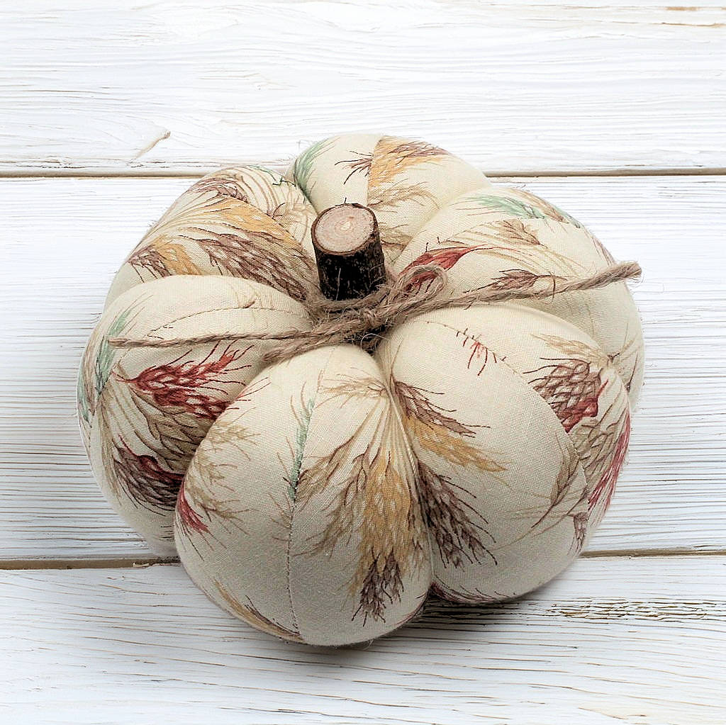 Decorative fabric pumpkin with an autumn wheat design