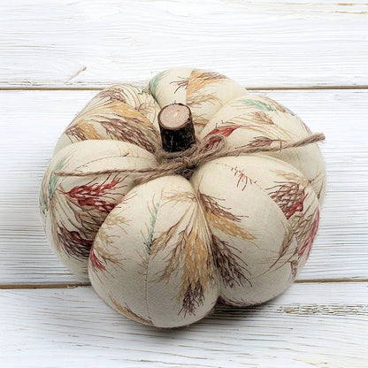 Decorative fabric pumpkin with an autumn wheat design