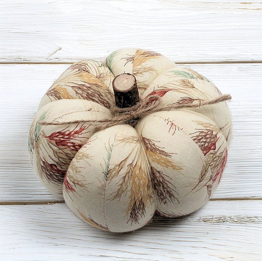 Decorative fabric pumpkin with an autumn wheat design