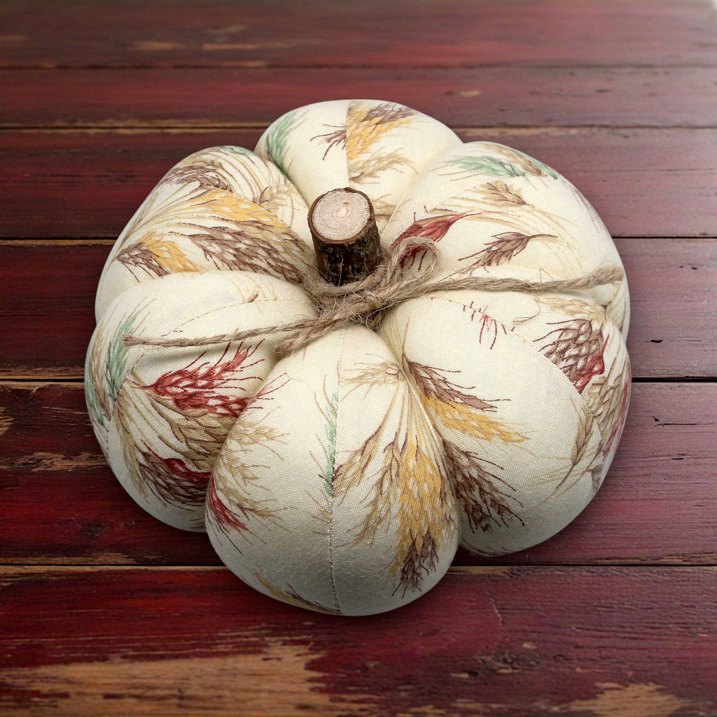 Decorative fabric pumpkin with an autumn wheat design