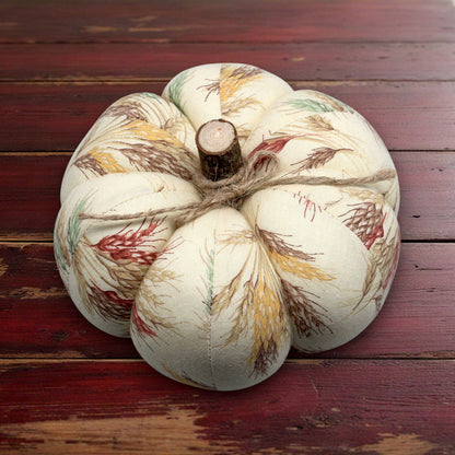Decorative fabric pumpkin with an autumn wheat design