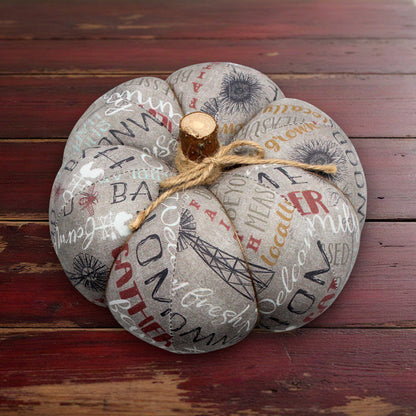 Decorative fabric pumpkin with a farmhouse design and text