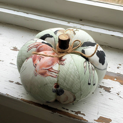 Decorative fabric pumpkin with a farmhouse animal design