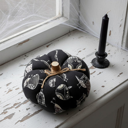 Decorative fabric pumpkin with a Halloween owls design