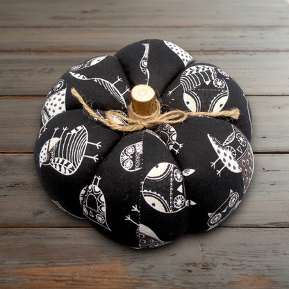 Decorative fabric pumpkin with a Halloween owls design
